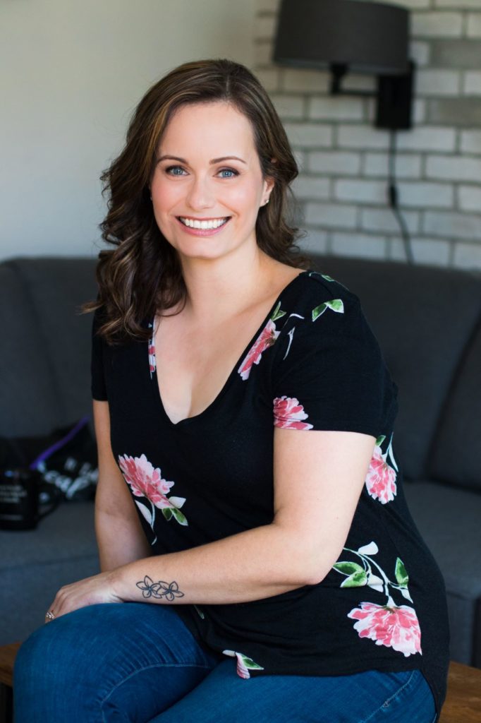 Julia Jarrett author Headshot black shirt and jeans