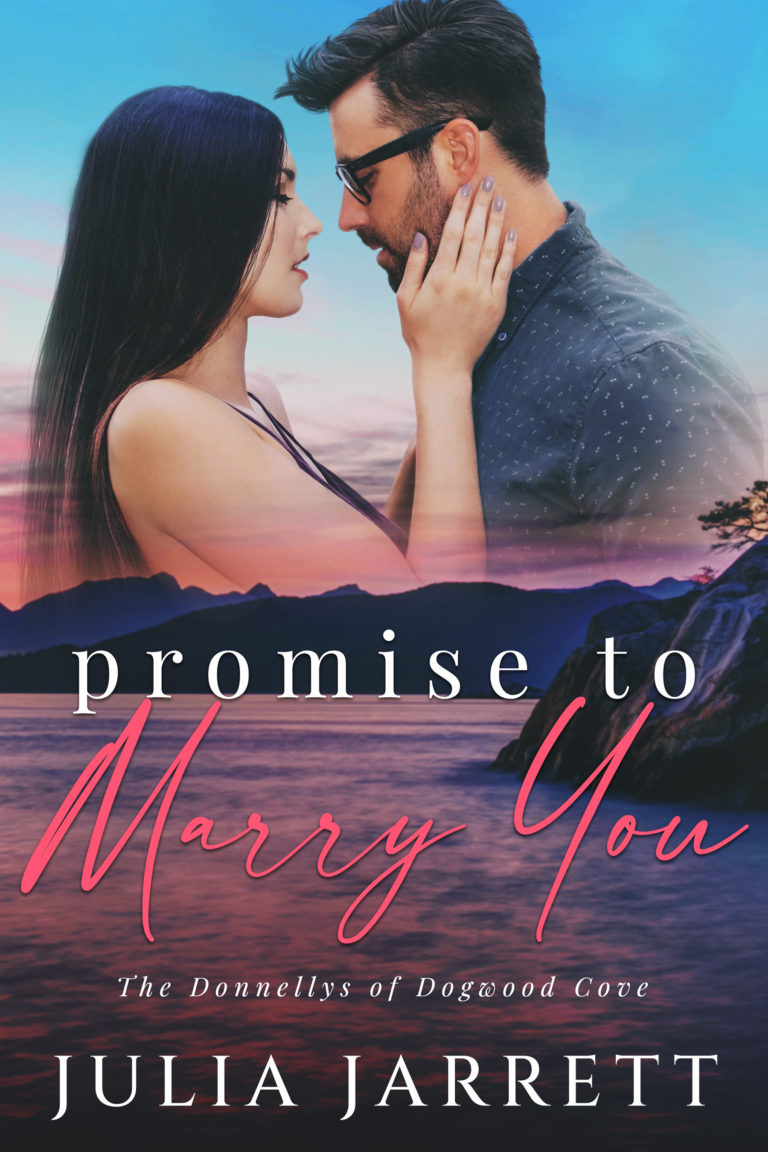 Man and women are facing each other. The woman has her hand on the man's check. Mountains landscape with lake at the bottom of the cover. Promise to Marry You (Donnellys at Dogwood Cove Book 4) by Julia Jarrett