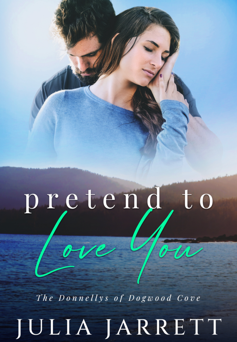 Man standing behind women embracing her with his hand on her cheek. Mountains landscape with lake. Pretend to Love You (Donnellys at Dogwood Cove Book 3) by Julia Jarrett